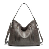 Wendy™ | Fringed Leather Bag
