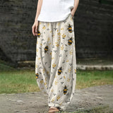 Marguerite – Ivory Wide-Leg Trousers with Floral Print