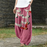 Noémie – Pink Wide-Leg Trousers with Crane Print