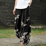 Françoise – Black Wide-Leg Trousers with Crane Print