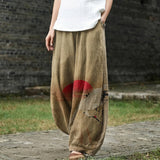 Madeleine – Beige Wide-Leg Trousers with Subtle Print