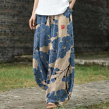 Geneviève – Beige Wide-Leg Trousers with Blue Print