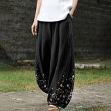 Armelle – Black Wide-Leg Trousers with Floral Print