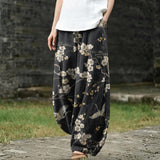 Ghislaine – Black Wide-Leg Trousers with Bird Print