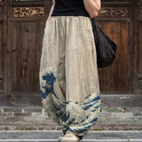 Colette – Beige Wide-Leg Trousers with Graphic Print