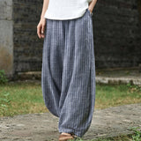 Anne-Marie – Grey Striped Wide-Leg Trousers